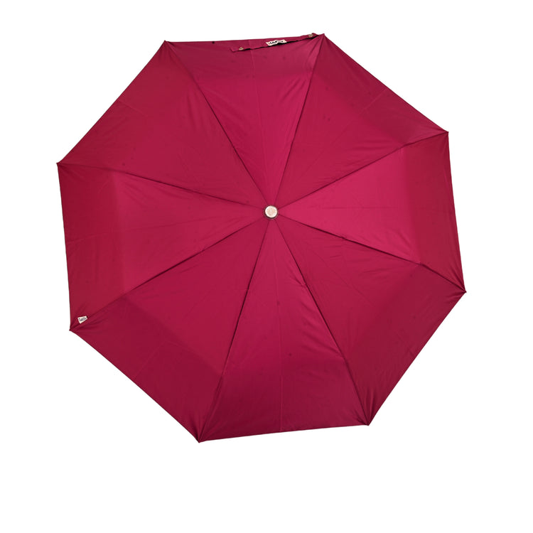 Pink umbrella on white background